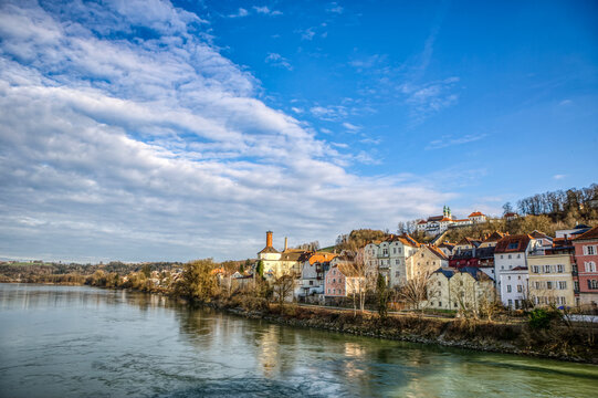 high dynamic range cityscape view of passau city with view at the river inn in late afternoon with l