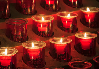 Wall Mural - Candles lit for prayer in the Saint Nicholas Cathedral in Monaco