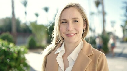 Sticker - Young blonde woman smiling confident standing at park