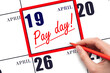 Hand writing text PAY DATE on calendar date April 19 and underline it. Payment due date