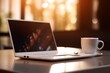© Thares2020 - Coffee Shop Lifestyle. Laptop and Coffee Cup Close Up on Blurred Cafe Table Background