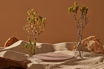 Canvas Print - Minimalist scene decorated with some stones and trees. An empty round podium placed on the sand to display cosmetic product