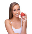© peopleimages.com - Red apple and woman with teeth health for natural, wellness and dental advertising. Beauty, model portrait and hand holding fruit for whitening results on an isolated and transparent png background