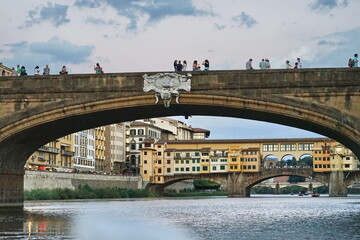 Wall Mural - Santa Trinita bridge seen from a boat on the Arno River in Florence, Tuscany, Italy