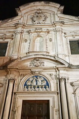 Wall Mural - Facade of Ognissanti church at night in Florence, Tuscany, Italy