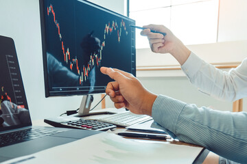 Wall Mural - Business Team Investment Entrepreneur Trading discussing and analysis graph stock market trading,stock chart concept