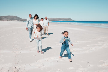 Poster - Family, beach and happy kids running in sand, playful and having fun while bonding outdoors. Face, children and parents with grandparents on summer vacation at sea on ocean trip in South Africa