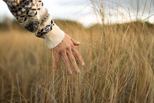 Man Hand Passing Above Field