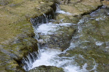 Natural waterfall over rocks