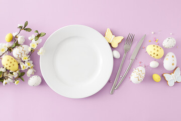 Wall Mural - Easter concept. Flat lay photo of empty circle plate with cutlery  yellow white easter eggs gingerbread sprinkles and spring blossom flowers on isolated lilac background with blank space