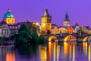 Wall Mural - Prague medieval architecture and Charles bridge over Vltava river at night, Czech Republic