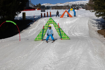 Happy family, enjoying ski holiday with children, sunny beautiful weather