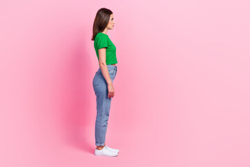 Poster - Full length photo of sweet cute lady dressed green t-shirt looking empty space isolated pink color background