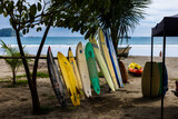 Fototapeta Tęcza - surfboard on the beach