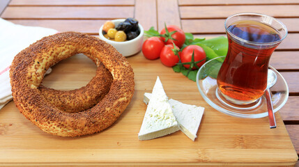 Wall Mural - Ankara simit - Sesame bagel - Simit - Tea and Ankara Castle composition in my table with cheese, tomato and olive garni 