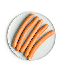 Poster - Tasty sausages. Frankfurters on plate isolated on white background.