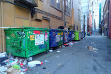 Garbage dumpsters in an alley