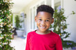 © Wavebreak Media - Portrait of happy african american boy looking at camera and smiling