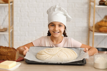 Sticker - Little baker holding tray with raw bread in kitchen