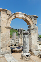 Sticker - Perge, or Perga is ancient Anatolian city in Pamphylia. Colonnade and ruined Demetrios Apollonios arch. Antalya region, Turkey (Turkiye). Travel and ancient history concept