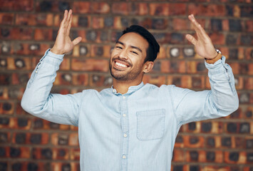 Wall Mural - Happy, excited and portrait of asian man and brick wall background for confidence, trendy and natural. Pride, cool and style with male and arms up for laughing, happiness and goofy expression
