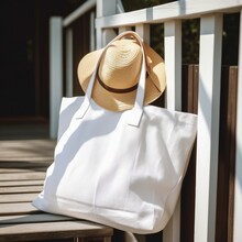 A White Linen Tote Bag On A Wooden Fence. White Shopper Bag Mockup