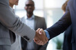 © Maurizio - Handshake between 2 businessman
