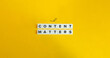 © photoopus - Content Matters Banner. Inbound Marketing and Social Media Concept. Letter Tiles on Yellow Background. Minimal Aesthetics.