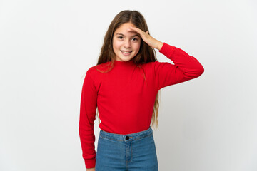 Wall Mural - Little girl over isolated white background saluting with hand with happy expression