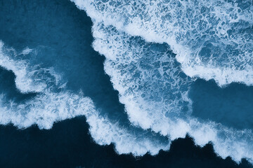 Wall Mural - Spectacular aerial top view background photo of ocean sea water white wave splashing in the deep sea. Drone photo backdrop of sea wave in bird eye waves.