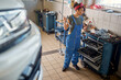 © luckybusiness - Woman  mechanic working. mechanic female having fun at work
