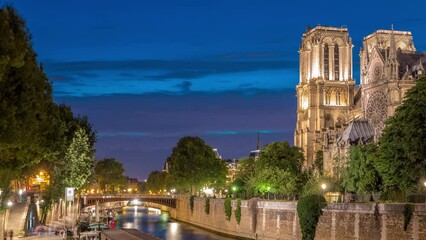 Wall Mural - Cathedral Notre Dame de Paris day to night transition timelapse after sunset in France. View from Bridge of the Archbishopric. Boat station and waterfront. Architecture and landmarks with dramatic sky