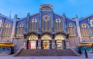 Wall Mural - VALENCIA, SPAIN - FEBRUARY 17, 2022: The Mercado central - Central market builiding at dusk.