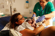 © Valentina Barreto/Stocksy - Baby birth in hospital