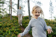 © Sergey Narevskih/Stocksy - Child running on hill near woman
