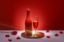 Two Glasses Of Rose Wine On A Red Background,