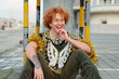 © Tessy Morelli/Stocksy - Happy queer man portrait