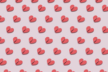 Pattern Of Repeated Torn Red Paper Hearts.