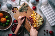 © Atolas/Stocksy - Cutting cranberries on a cutting board
