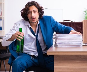 Poster - Young drunk employee in the office