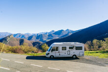 Panoramic View Of A Mountain Landscape With A Rv Vehicle