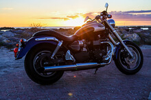 Motorcycle At Sunset