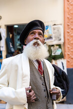 Elegant Man With Beret Walking In The Streets Of Havana
