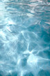 © Lindsey Rivera/Stocksy - Swimming Pool Surface Blur
