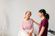 © Studio Firma/Stocksy - Senior Woman at Doctor Checkup