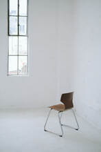 Wooden Chair In Empty Studio