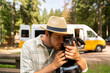 © Alba Vitta/Stocksy - man with dog and camper van
