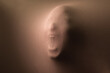 © Ibai Acevedo/Stocksy - Surreal face screaming resembling a nightmare