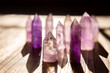 Pointed purple Caribbean calcite standing up with sun shining through