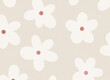 © Palina Liashkovich/Stocksy - Floral print on beige  background.